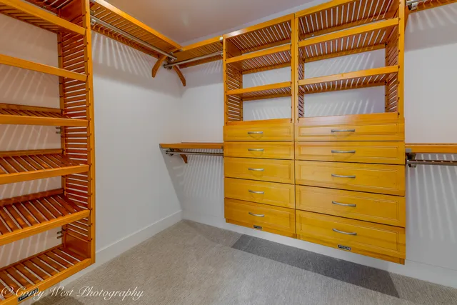 a view of an empty room with stairs