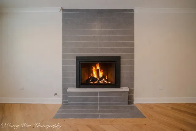 a living room with a fireplace