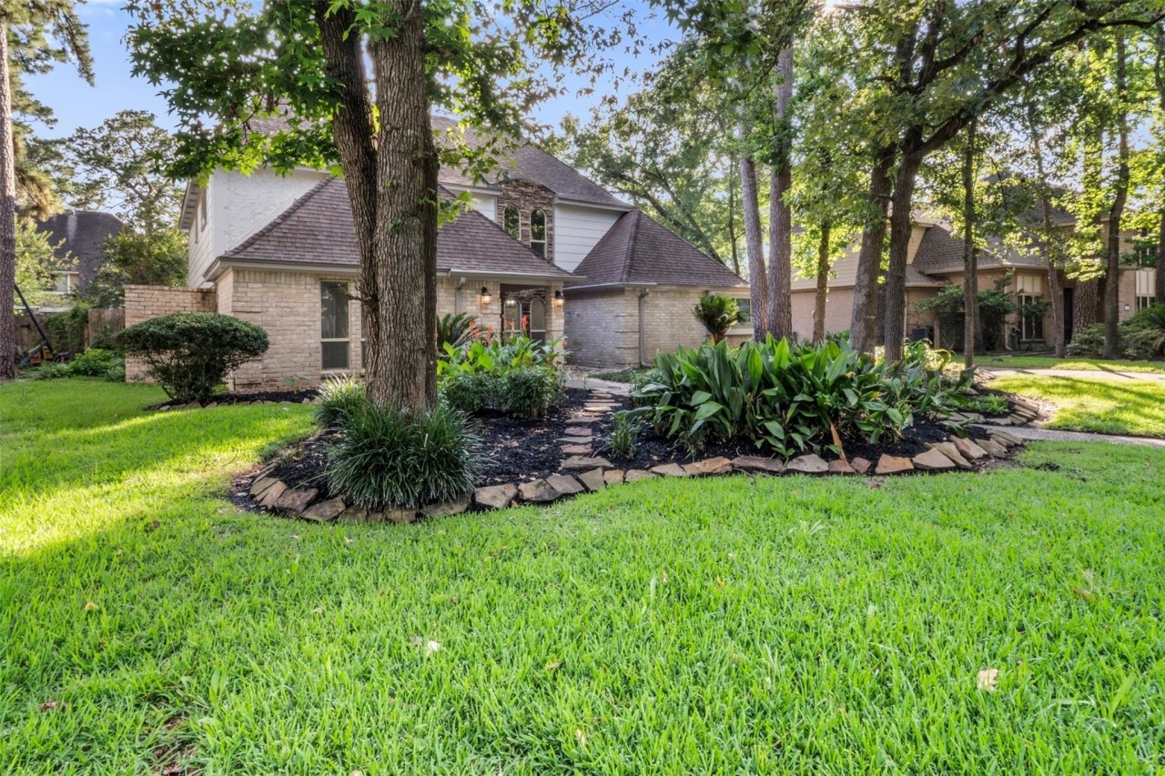 9543 Enstone Circle Spring, TX 77379 - Photo 33 of 36 Shaded side yard with mature trees