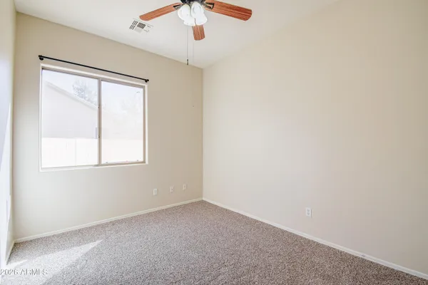 a workspace with furniture window and wooden floor