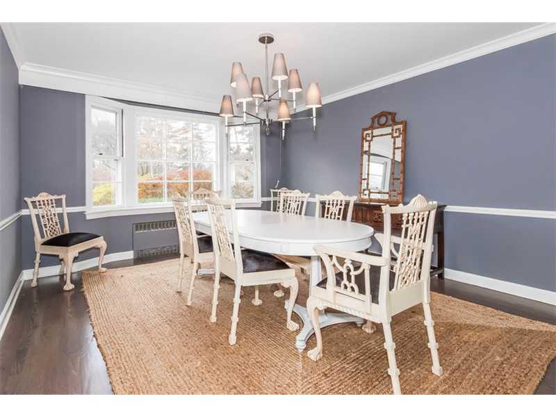 5 Bridle Path Lane Riverside, CT 06878 - Photo 6 of 11 a view of a dining room with furniture a chandelier and wooden floor