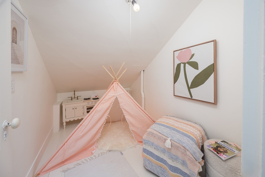 6 Warren Square, Unit 2 Boston, MA 02130 - Photo 18 of 18 a view of a bedroom with bed and closet