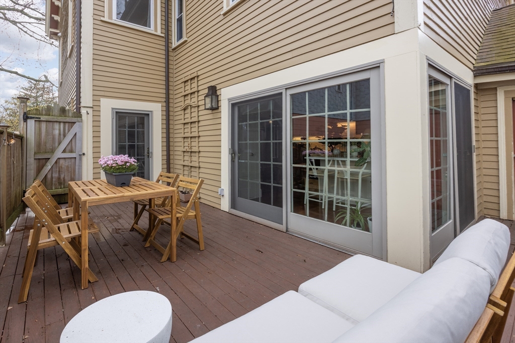 6 Warren Square, Unit 2 Boston, MA 02130 - Photo 9 of 18 a balcony with table and chairs
