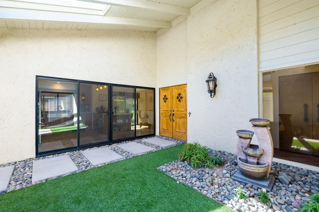 a house view with a backyard space