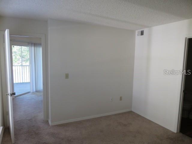 4115 Chatham Oak Court, Unit 211 Tampa, FL 33624 - Photo 4 of 21 a view of an empty room