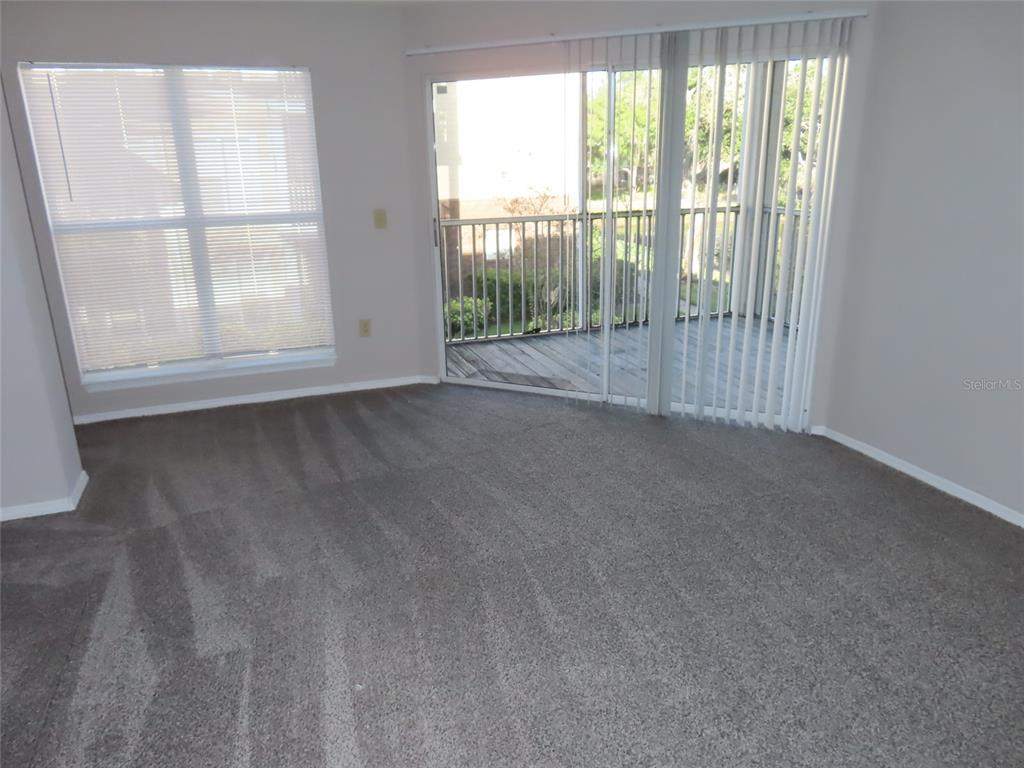 4115 Chatham Oak Court, Unit 211 Tampa, FL 33624 - Photo 10 of 21 a view of room with window