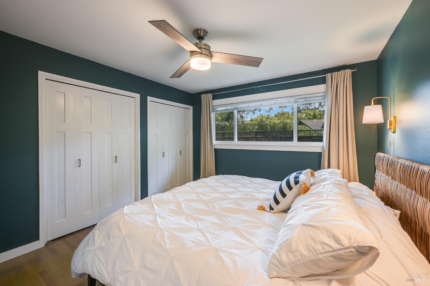 2009 Hidden Valley Drive Santa Rosa, CA 95404 - Photo 11 of 26 a large white bed in a bedroom next to a window