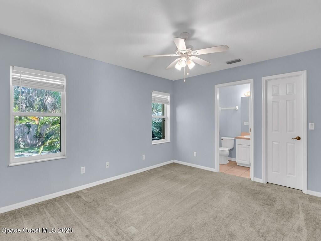 534 Sloane Street Sebastian, FL 32958 - Photo 19 of 36 a view of an empty room with a window