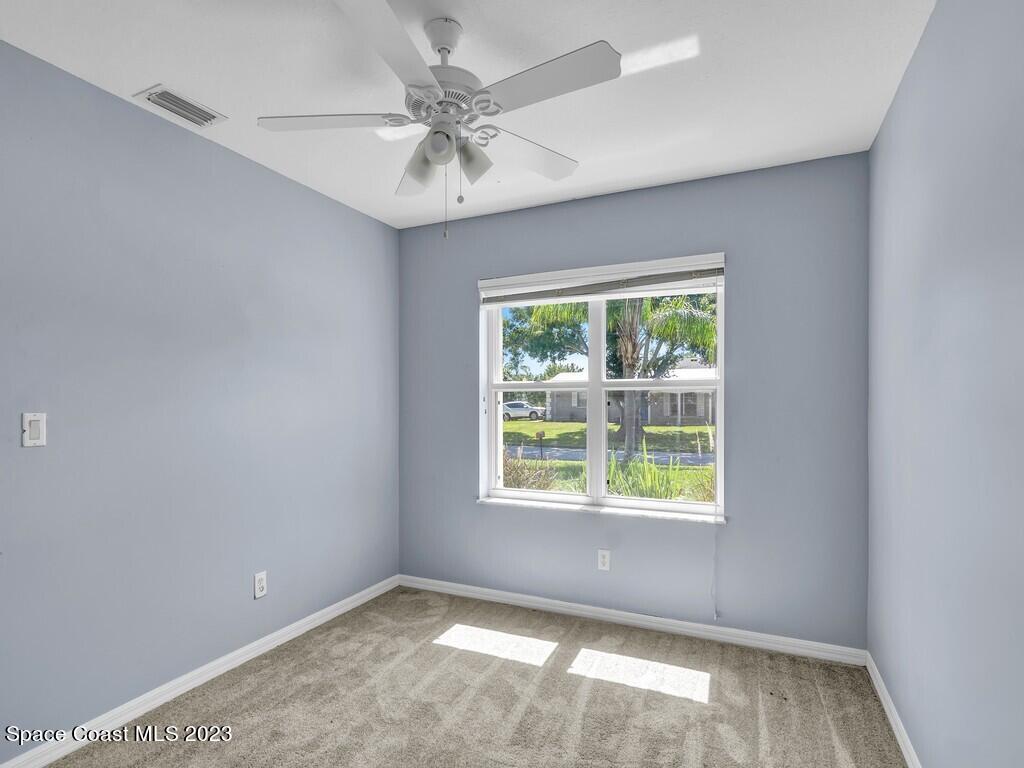 534 Sloane Street Sebastian, FL 32958 - Photo 26 of 36 an empty room with a window