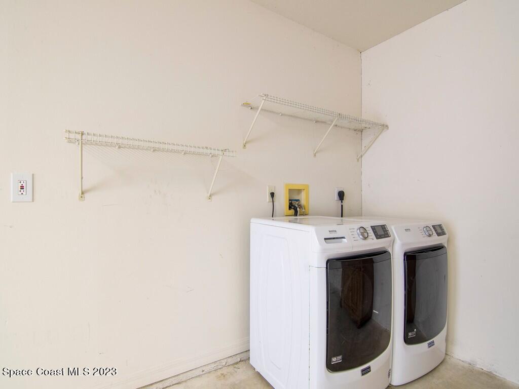 534 Sloane Street Sebastian, FL 32958 - Photo 29 of 36 a utility room with dryer and washer