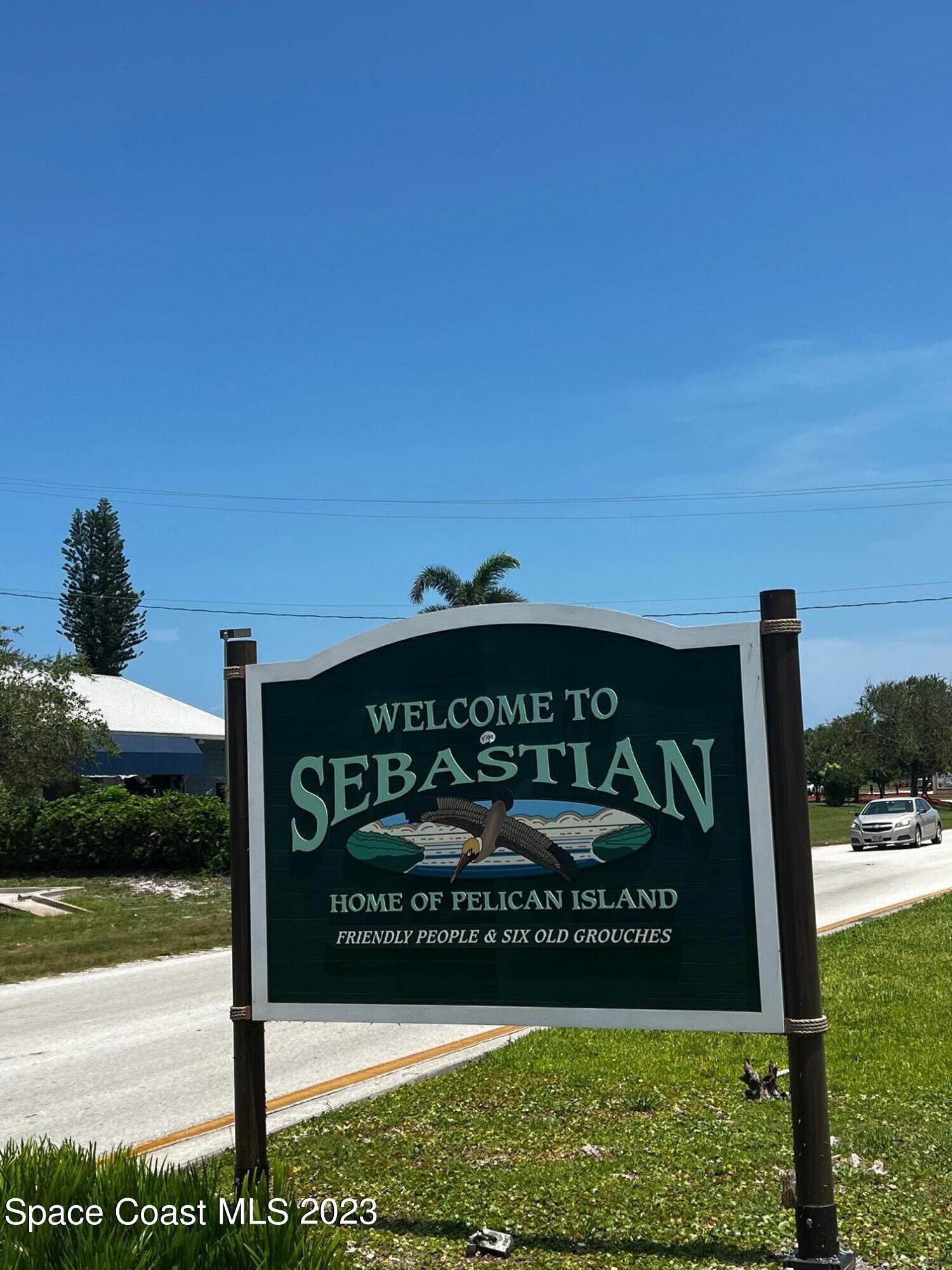 534 Sloane Street Sebastian, FL 32958 - Photo 30 of 36 a sign on the side of the road