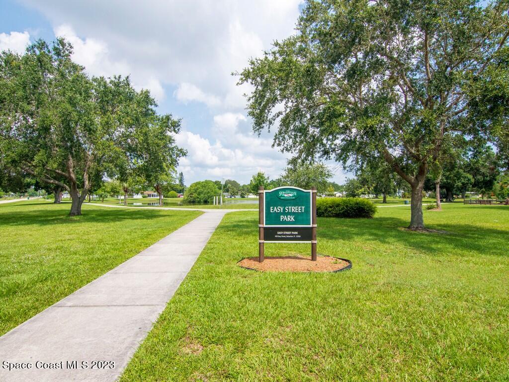 534 Sloane Street Sebastian, FL 32958 - Photo 31 of 36 a swimming pool with lots of green space and trees