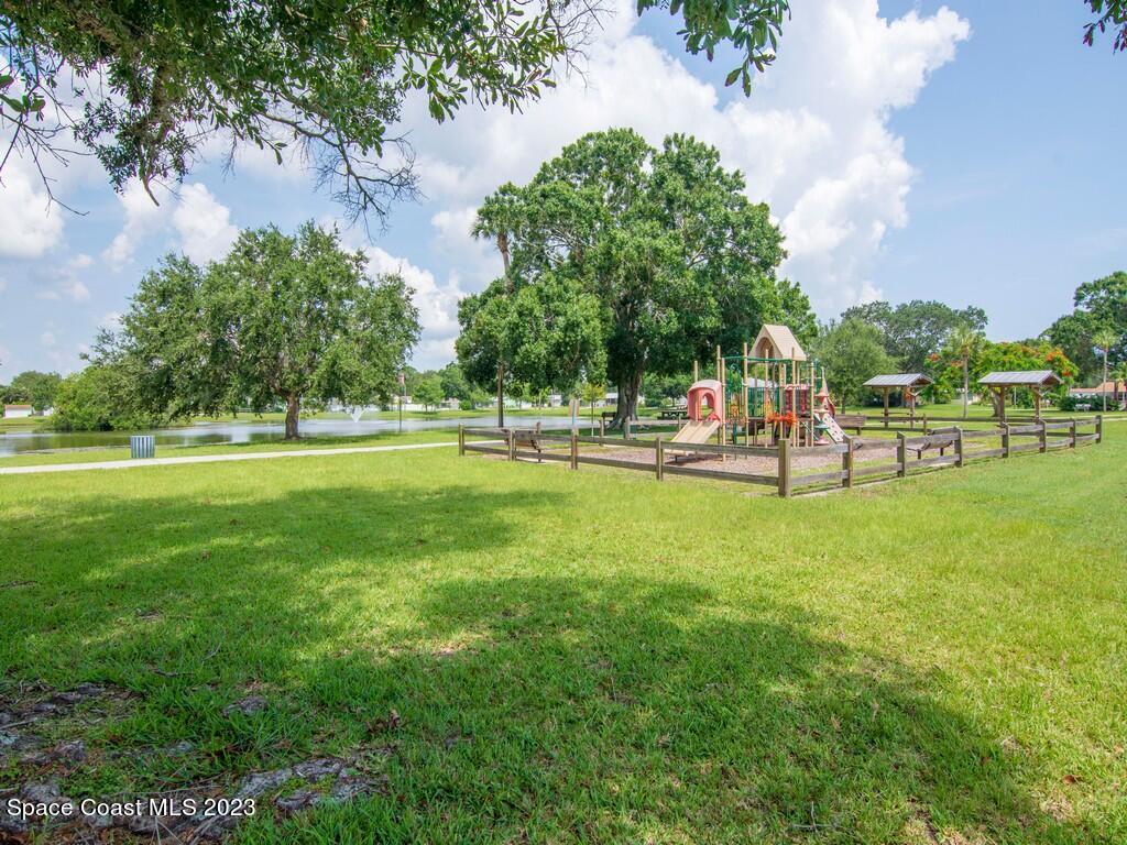 534 Sloane Street Sebastian, FL 32958 - Photo 32 of 36 a view of a park with swings and slides