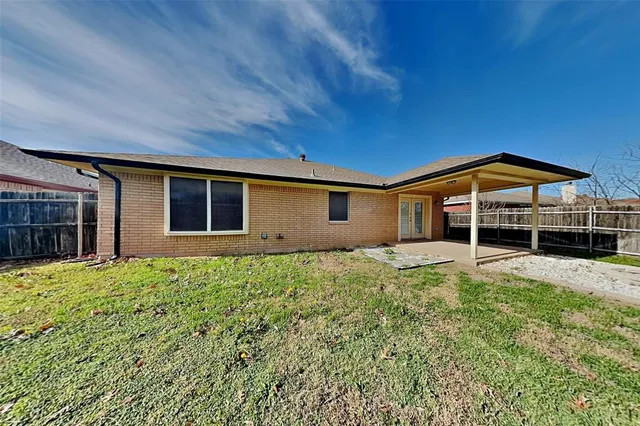 a house view with a backyard space