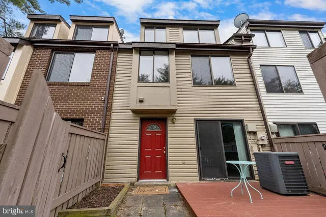 a front view of a house with a garage