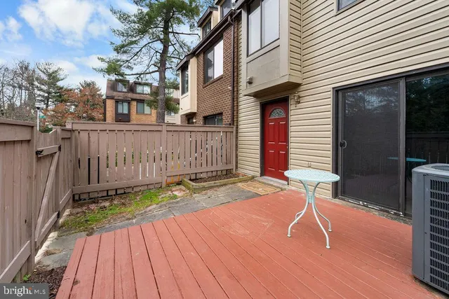 a view of deck with wooden floor and outdoor seating