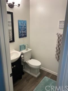 31841 Monique Circle Temecula, CA 92591 - Photo 20 of 41 a bathroom with a toilet a sink and mirror