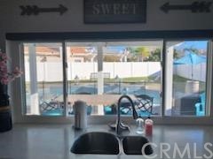 31841 Monique Circle Temecula, CA 92591 - Photo 21 of 41 a kitchen with a large window and a sink