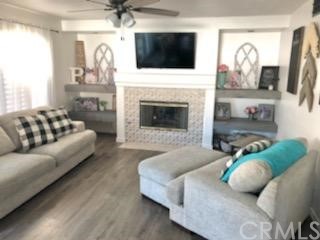 31841 Monique Circle Temecula, CA 92591 - Photo 25 of 41 a living room with furniture fireplace and flat screen tv