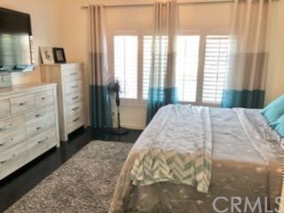 31841 Monique Circle Temecula, CA 92591 - Photo 28 of 41 a bedroom with a bed and a flat tv screen on dresser