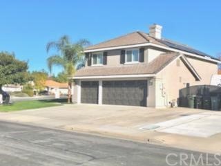 31841 Monique Circle Temecula, CA 92591 - Photo 3 of 41 a front view of a house with a yard and garage