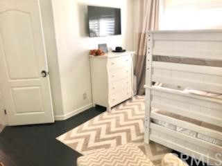31841 Monique Circle Temecula, CA 92591 - Photo 36 of 41 a view of a bedroom with wooden floor and windows