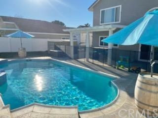 31841 Monique Circle Temecula, CA 92591 - Photo 8 of 41 a swimming pool with outdoor seating and yard