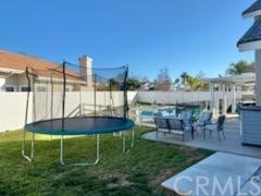 31841 Monique Circle Temecula, CA 92591 - Photo 10 of 41 a swimming pool with outdoor seating and yard