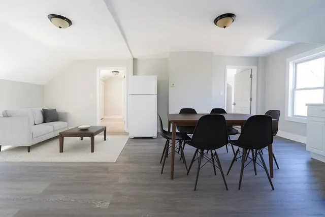 a view of a dining room with furniture