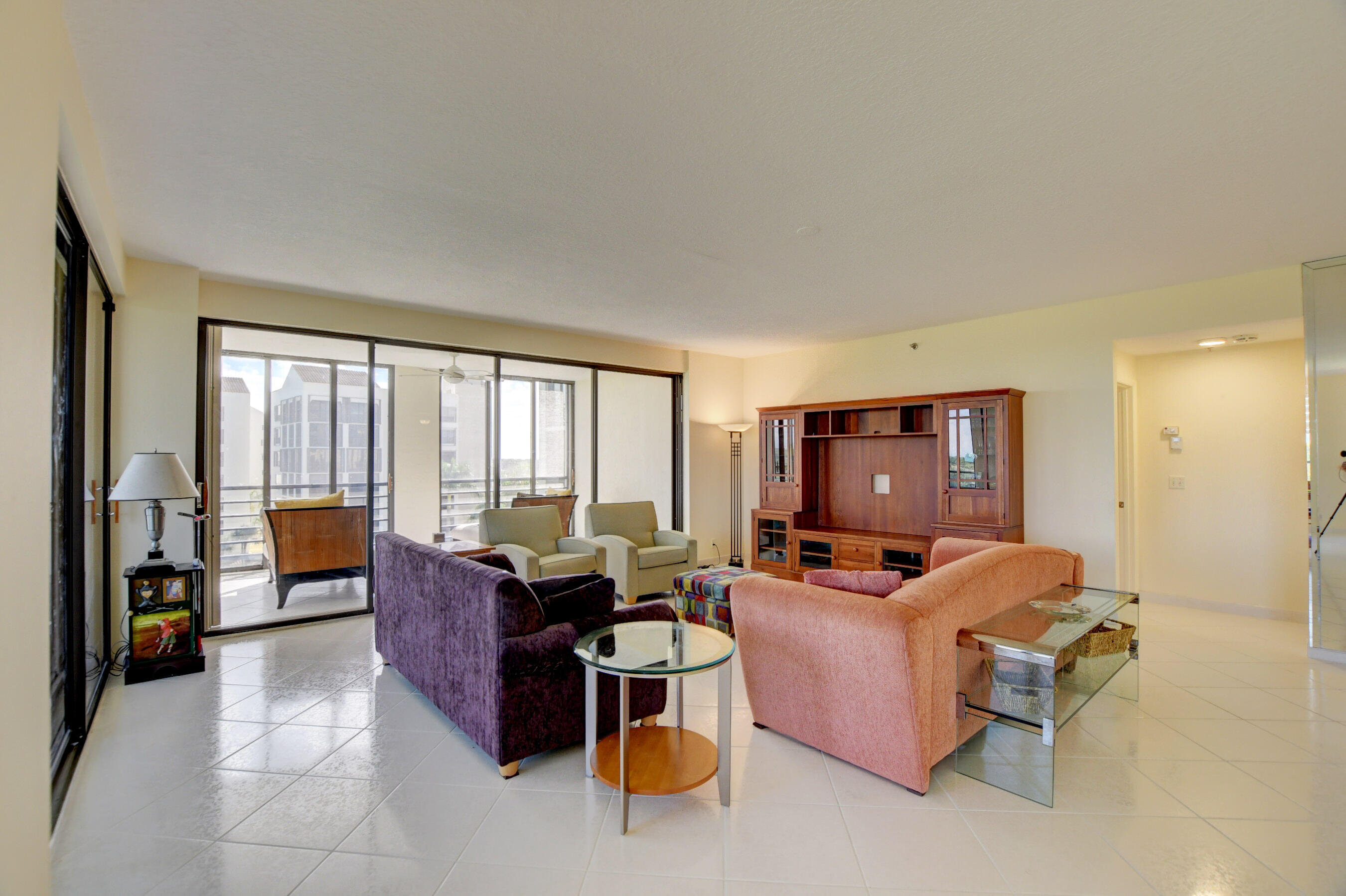 7351 Promenade Drive, Unit 602F Boca Raton, FL 33433 - Photo 14 of 48 11 living room towards master