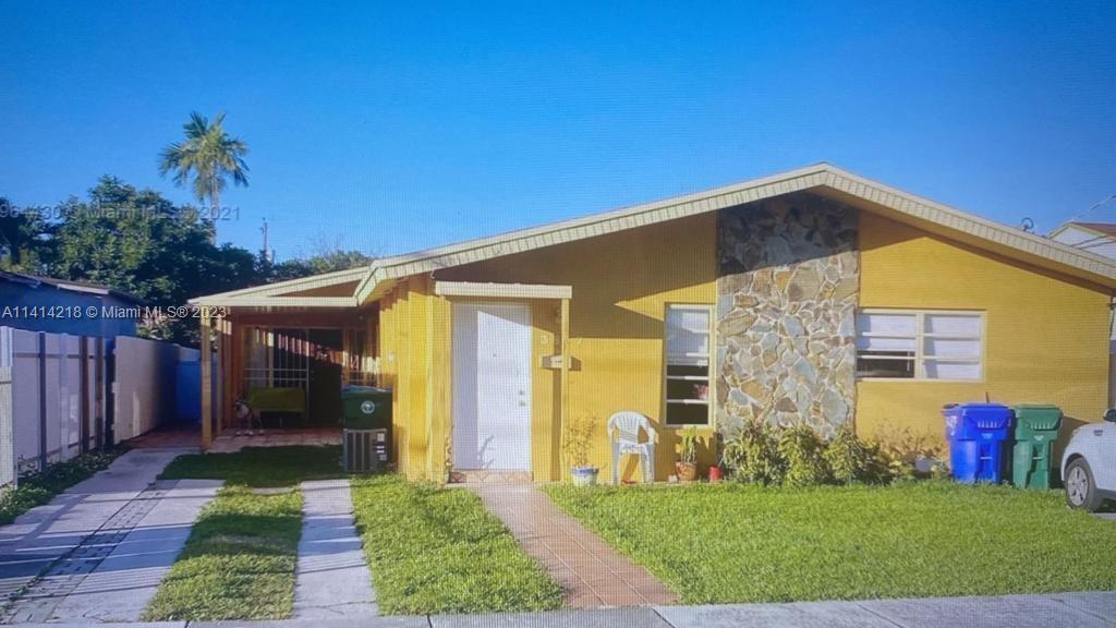 3637 Southwest 14th Street, Unit 2 Miami, FL 33145 - Photo 8 of 9 a view of a house with backyard