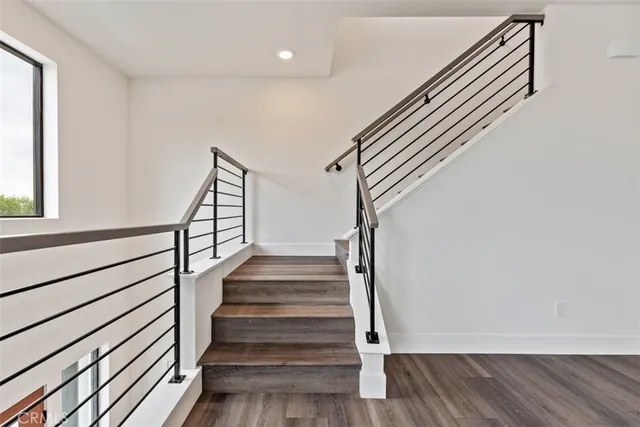 a view of entryway with wooden floor