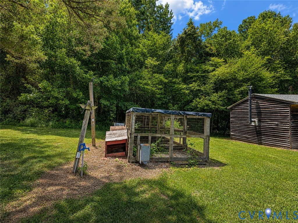 218 Deer Run Road Blackstone, VA 23824 - Photo 71 of 90 Expansive green lawn with mature trees bordering t