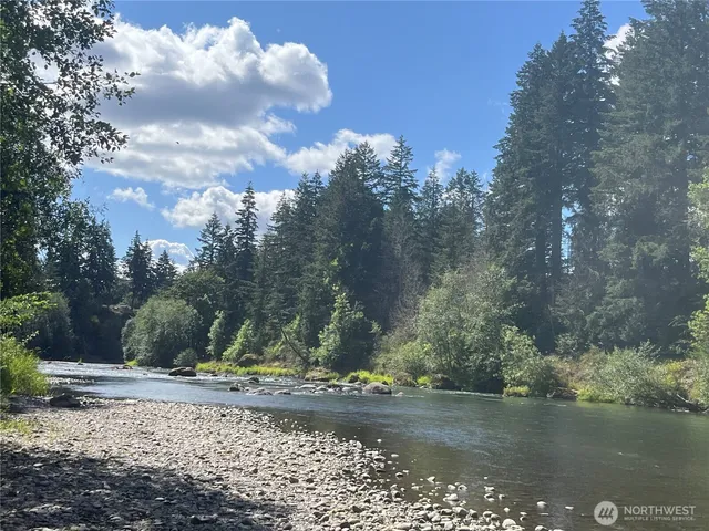 a view of a lake from a yard