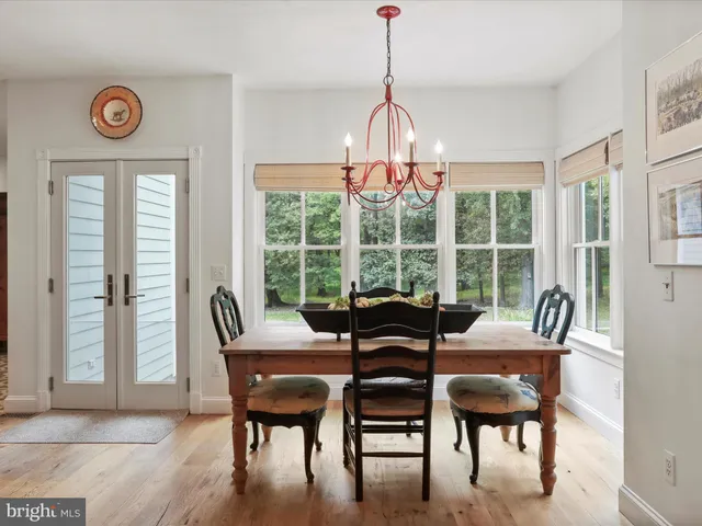 a kitchen with granite countertop stainless steel appliances and wooden cabinets