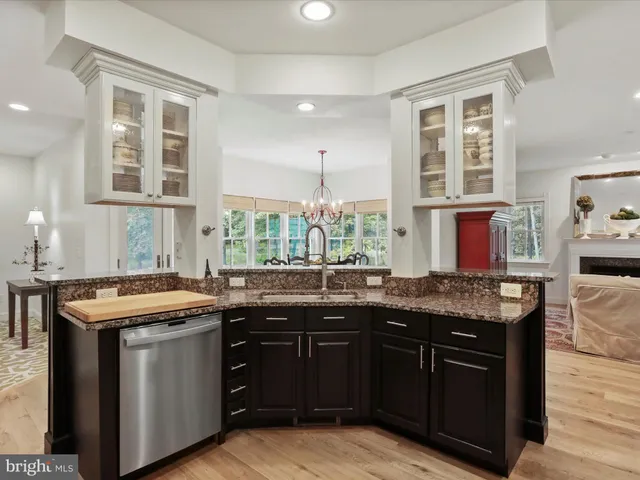 a spacious bedroom with a bed and a window