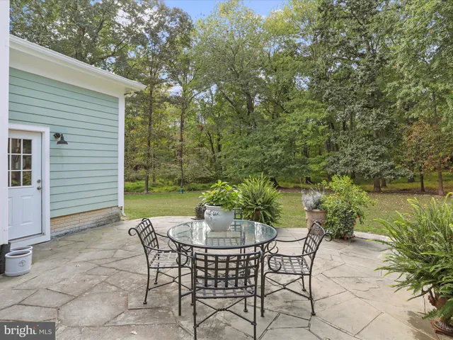 a view of a bench in a garden