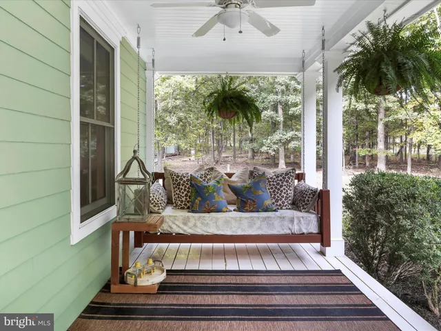 a front view of house with yard outdoor seating and barbeque oven
