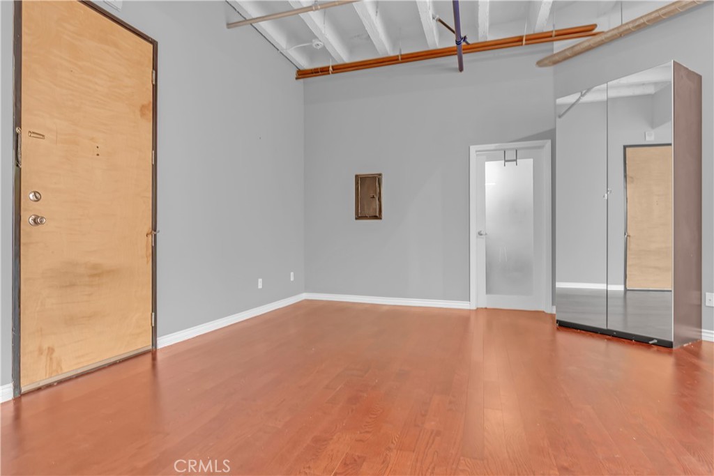 312 West 5th Street, Unit 1109 Los Angeles, CA 90013 - Photo 17 of 47 a view of an empty room with a window