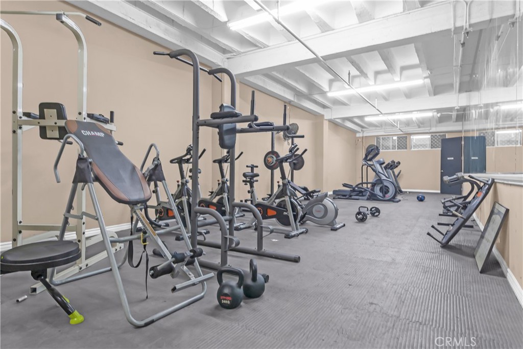 312 West 5th Street, Unit 1109 Los Angeles, CA 90013 - Photo 45 of 47 a view of a room with gym equipment