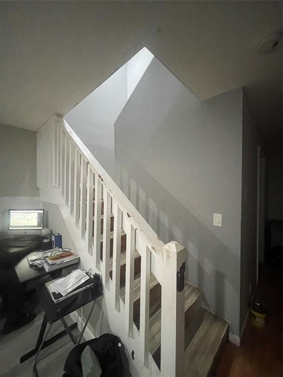 7823 Tam Oshanter Boulevard, Unit 7823 Pompano Beach, FL 33068 - Photo 2 of 6 a view of a hallway with chairs and stairs