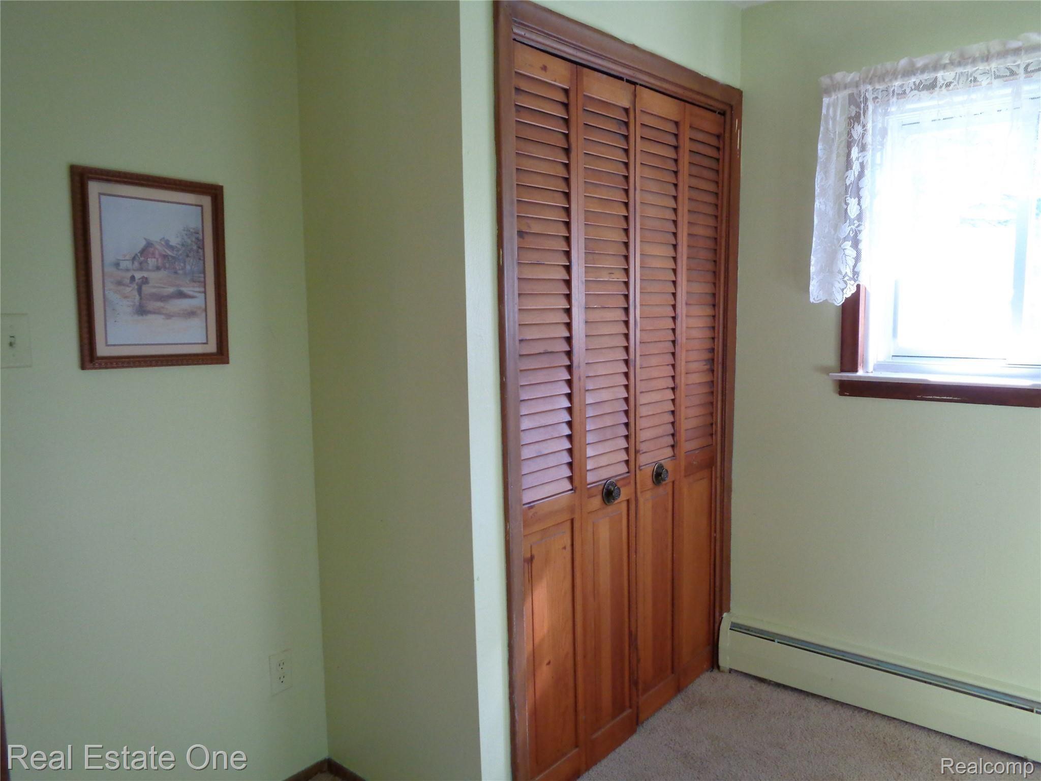 5960 Mills Road Deckerville, MI 48427 - Photo 44 of 79 Closet view. This smallest bedroom would also make a great office space if needed.