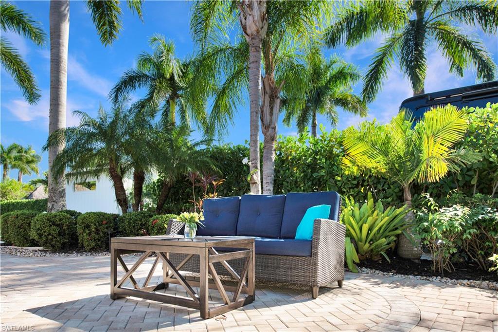 13553 Snapper Lane Naples, FL 34114 - Photo 4 of 24 a view of outdoor space yard and porch