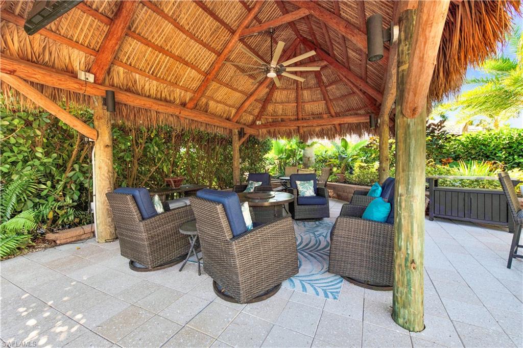 13553 Snapper Lane Naples, FL 34114 - Photo 10 of 24 a outdoor living space with furniture and garden view