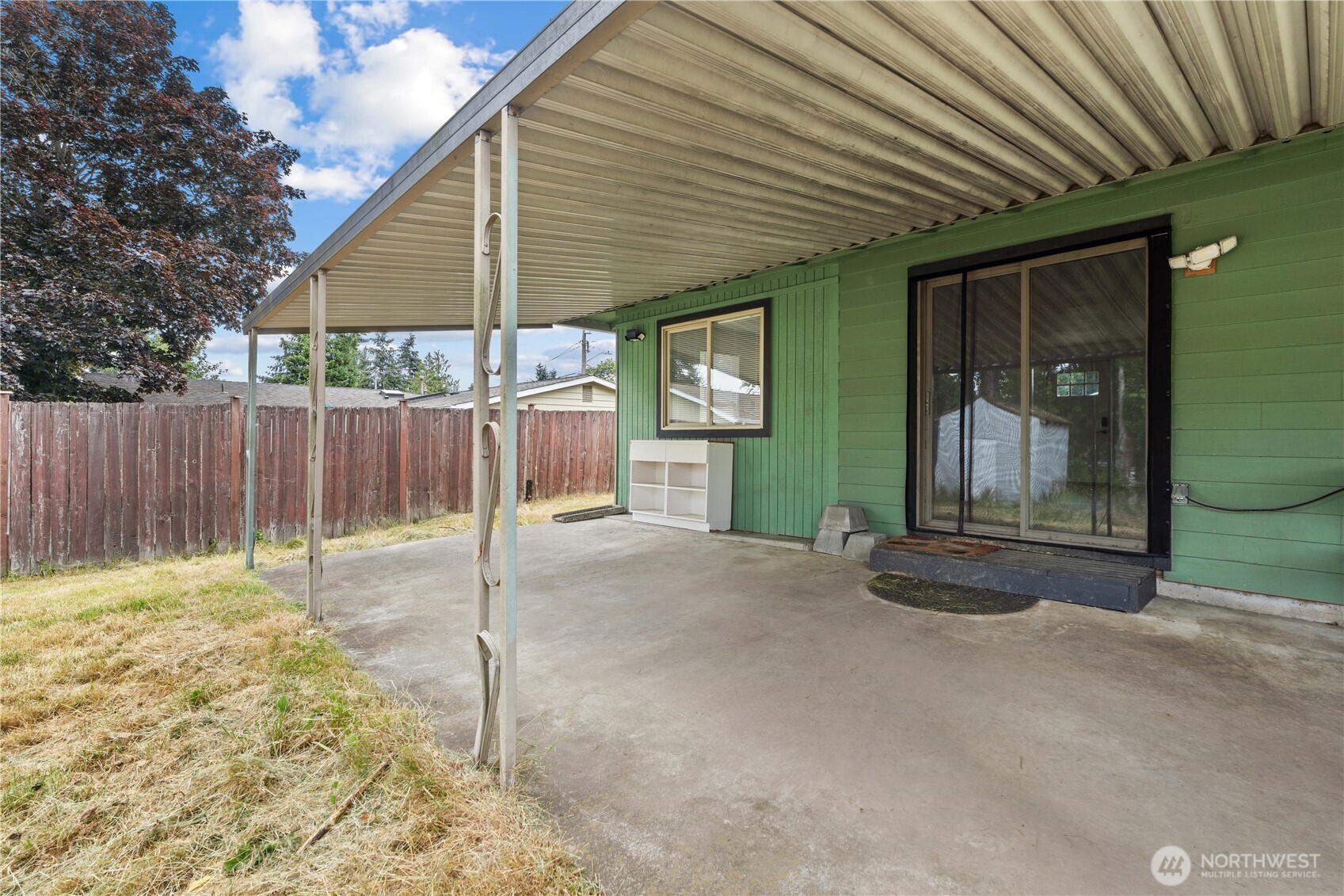 2229 Southwest 330th Street Federal Way, WA 98023 - Photo 12 of 30 a backyard of a house with table and chairs