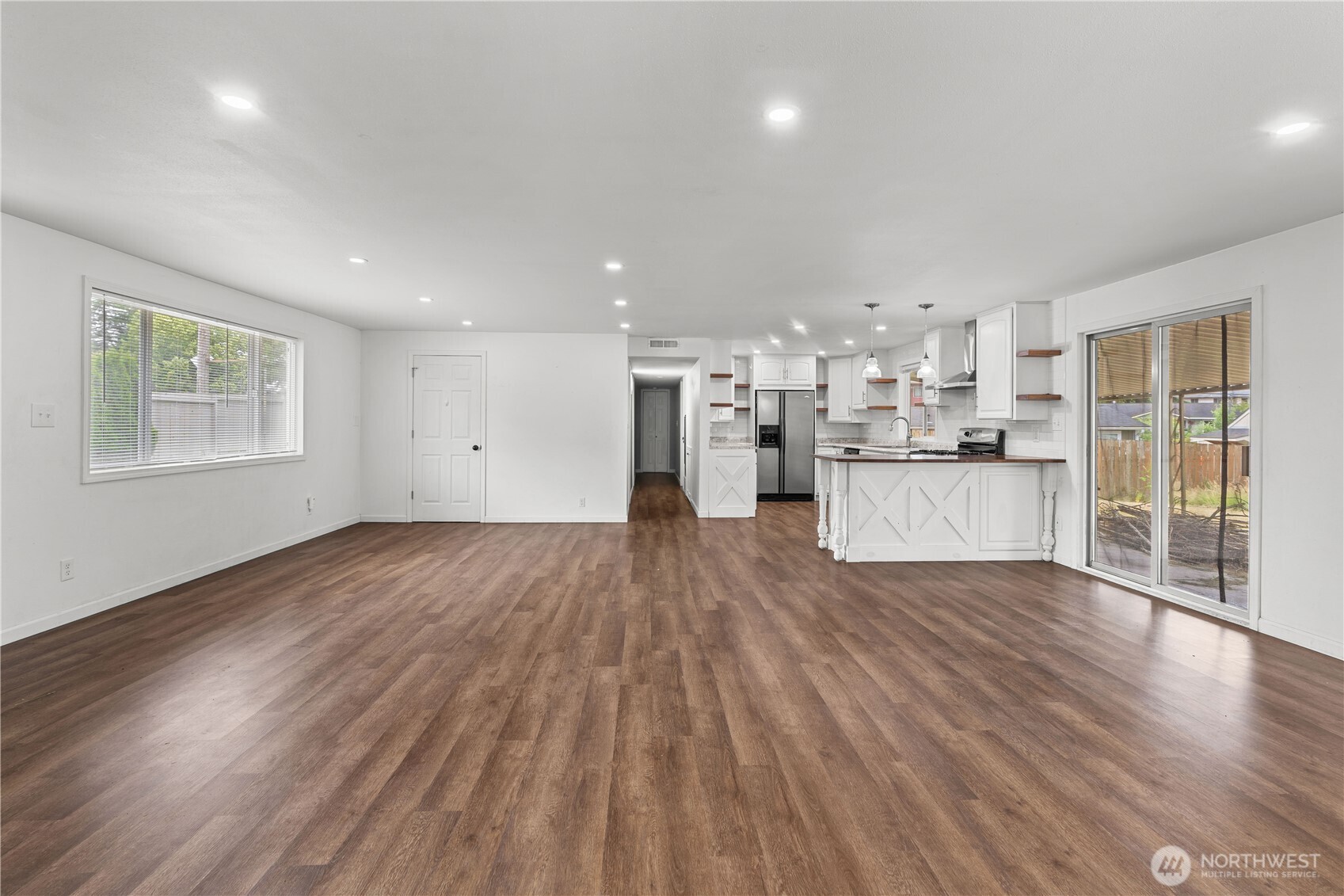 2229 Southwest 330th Street Federal Way, WA 98023 - Photo 20 of 30 a view of kitchen with cabinets and wooden floor