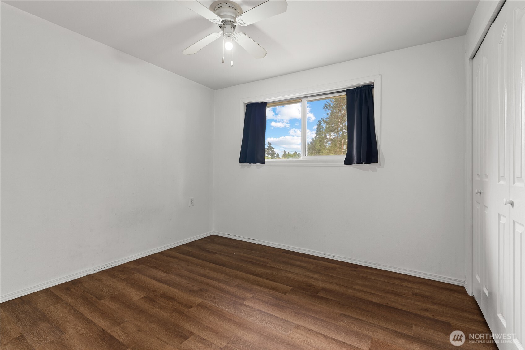 2229 Southwest 330th Street Federal Way, WA 98023 - Photo 22 of 30 a view of empty room with wooden floor