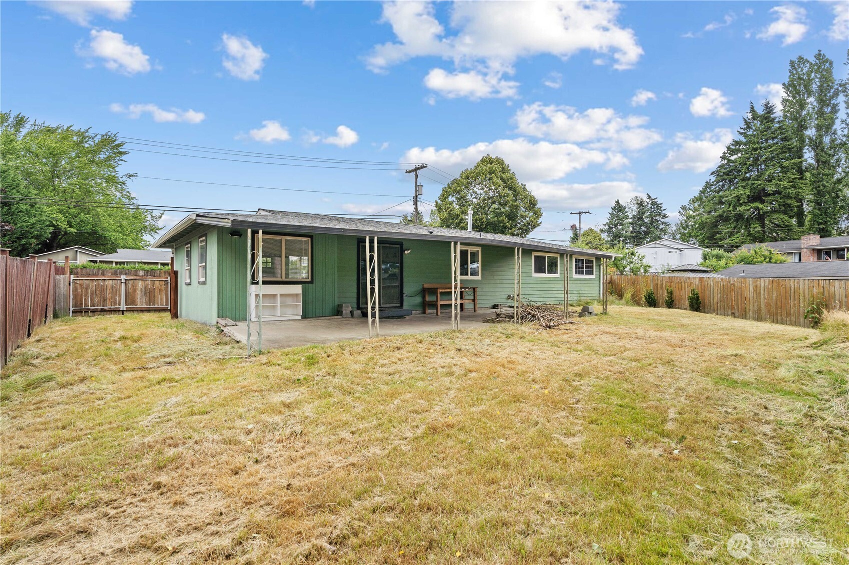 2229 Southwest 330th Street Federal Way, WA 98023 - Photo 7 of 30 a view of a house with a backyard and a tree