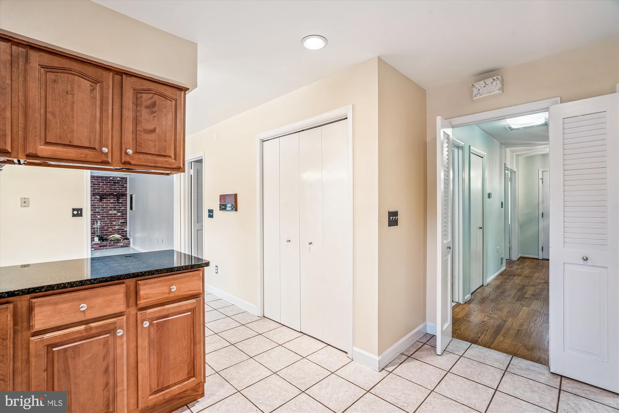 1913 Hopefield Road Silver Spring, MD 20905 - Photo 17 of 58 a kitchen with stainless steel appliances granite countertop a refrigerator and a stove