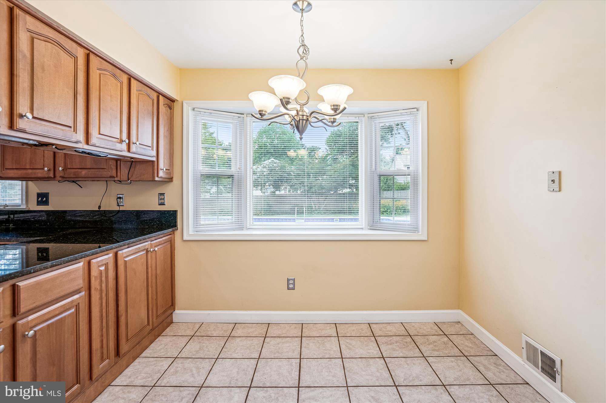 1913 Hopefield Road Silver Spring, MD 20905 - Photo 21 of 58 a view of a kitchen with a sink cabinets and window